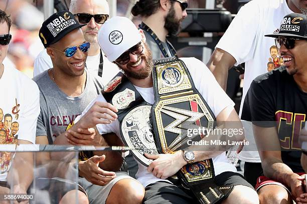 Richard Jefferson and Kevin Love of the Cleveland Cavaliers react during the Cleveland Cavaliers 2016 NBA Championship victory parade and rally on...