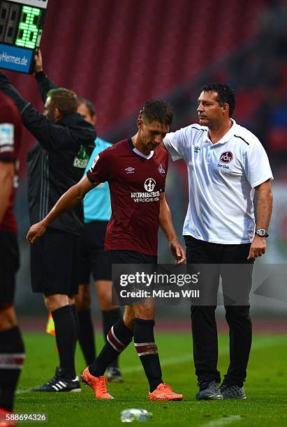 Jakub Sylvestr of Nuernberg and Alois Schwartz , head coach of Nuernberg during the Second Bundesliga match between 1. FC Nuernberg and 1. FC...