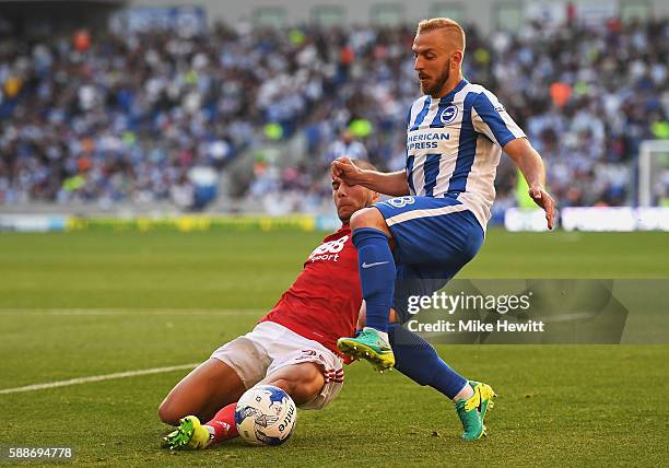 Pajtim Kasami of Nottingham Forest tackles Jiri Skalak of Brighton and Hove Albion during the Sky Bet Championship match between Brighton & Hove...