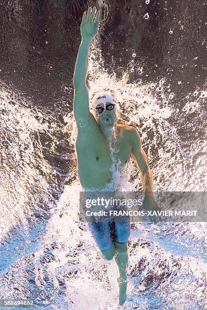 Underwater view shows USA's Connor Jaeger taking part in the Men's 1500m Freestyle heats during the swimming event at the Rio 2016 Olympic Games at...