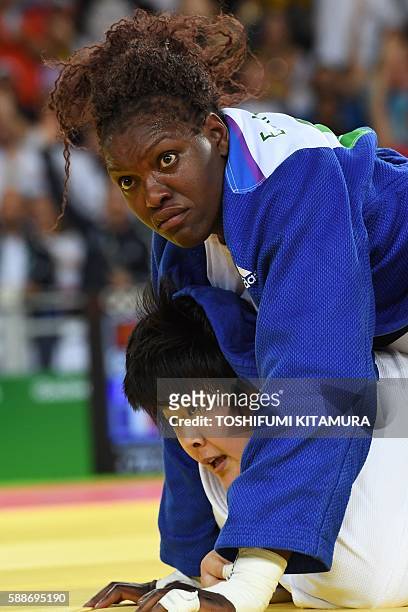 France's Emilie Andeol competes with China's Yu Song during their women's +78kg judo contest semifinal A match of the Rio 2016 Olympic Games in Rio...