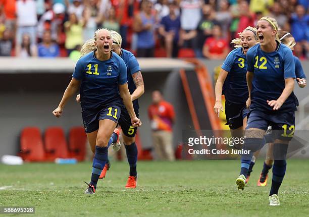 Stina Blackstenius and Olivia Schough of Sweden celebrates their 1-1 win over team United States during the Women's Football Quarterfinal match at...
