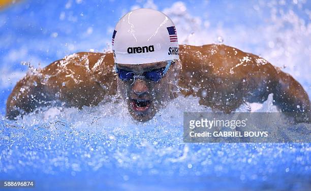 Tom Shields competes in the Men's 4x100m Medley Relay heat 2 during the swimming event at the Rio 2016 Olympic Games at the Olympic Aquatics Stadium...