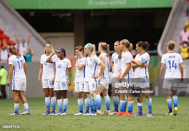 The United States team reacts after their 1-1 loss to Sweden during the Women's Football Quarterfinal match at Mane Garrincha Stadium on Day 7 of the...