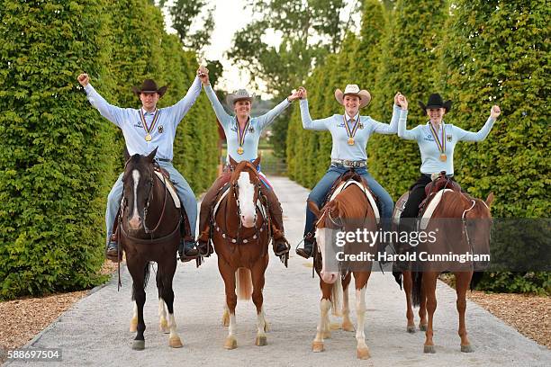 Gina Schumacher of Germany celebrates with her team their victory after the SVAG FEI European Championship Reining Young riders 2016 at the CS Ranch...