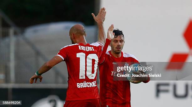 Daniel Brueckner and Goalgetter Carsten Kammlott of Erfurt celebration the Goal 2:2 for Erfurt during the third league match between SF Lotte and...