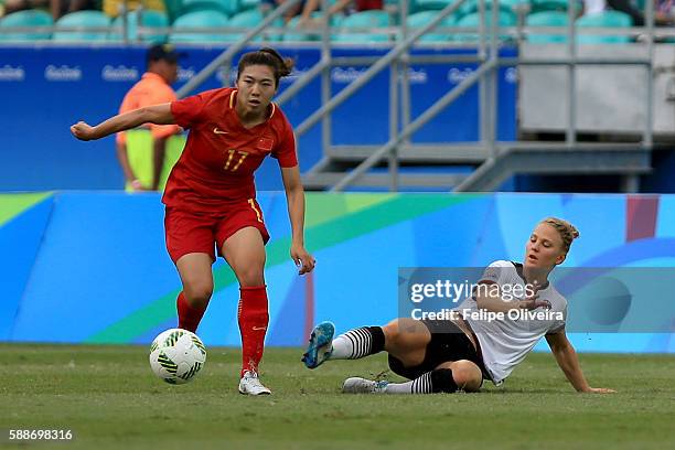 Yasha Gu of China is challenged by Leonie Maier of Germany during the Women's Football Quarterfinal match between China and Germany on Day 7 of the...