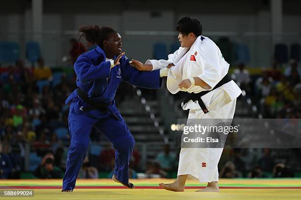 Emilie Andeol of France competes against Song Yu of China during the Women's +78kg Judo contest on Day 7 of the Rio 2016 Olympic Games at Carioca...