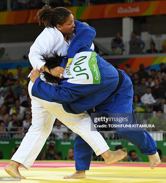 Turkey's Kayra Sayit competes with Japan's Kanae Yamabe during their women's +78kg judo contest bronze medal A match of the Rio 2016 Olympic Games in...