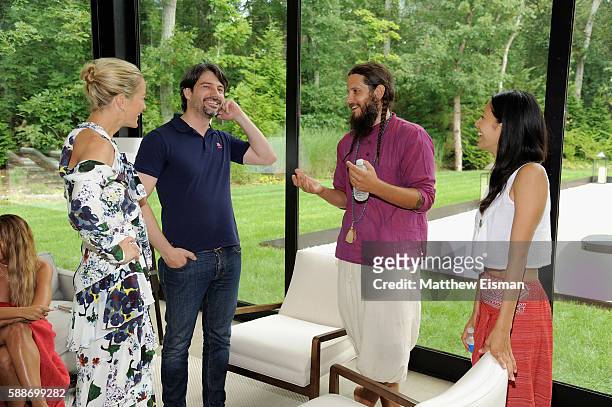 Carolyn Murphy, Bregt Ectors, Jarrod Byrne Mayor and Melody Balczon attend the Buick celebration of the new Envision in the Hamptons at Buick Studio...