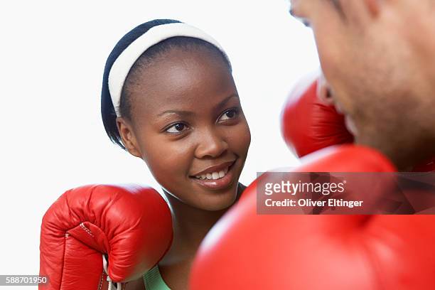 people having friendly boxing match - oliver eltinger stock-fotos und bilder