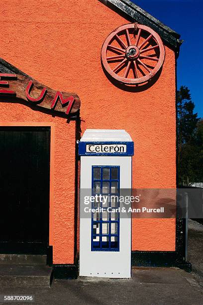 phone booth with gaelic sign - sneem stock pictures, royalty-free photos & images