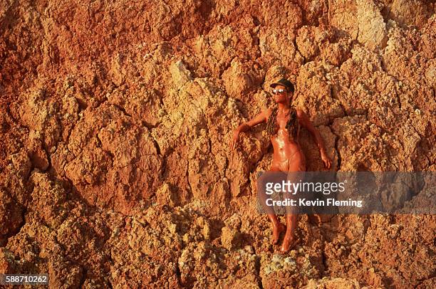 woman sunbathing in clay - gay head cliff stock pictures, royalty-free photos & images