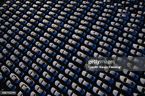 imported cars line the port of wilmington - abundance fotografías e imágenes de stock