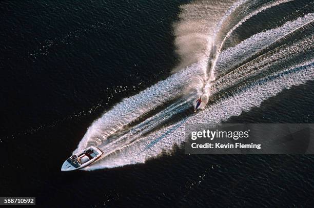 aerial view of a water skier - wasserskifahren stock-fotos und bilder