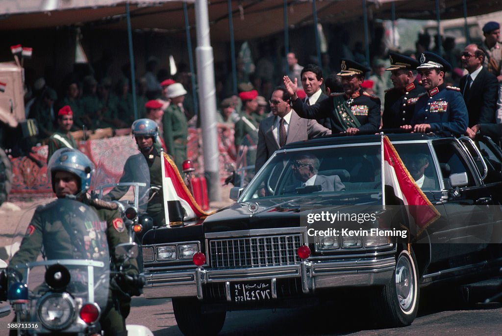 Anwar Sadat Riding in an Open Limousine