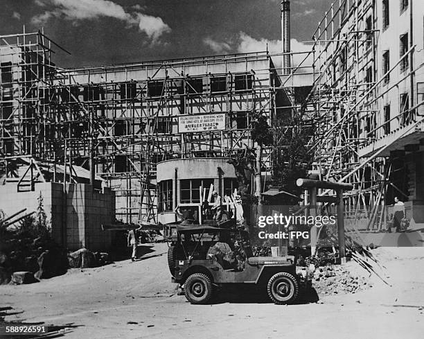 The reconstruction of the Sanno Hotel in Tokyo, Japan, circa 1947. The hotel was largely destroyed by Allied bombing during World War II, and was...