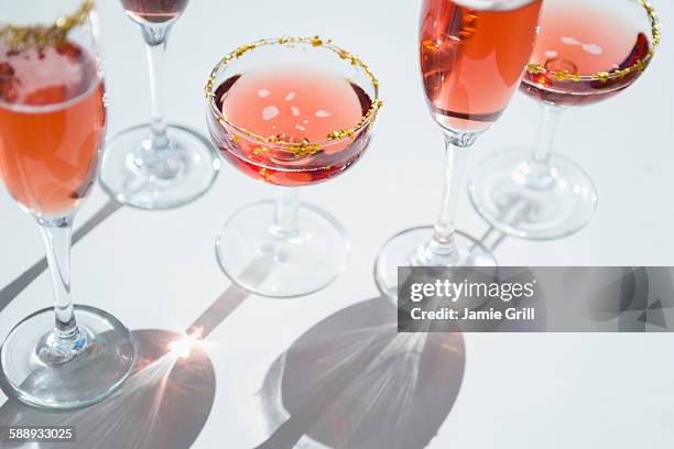 different wine glasses on white - champagne glass stockfoto's en -beelden