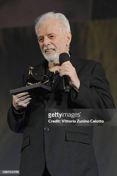 Alejandro Jodorowsky poses with the Pardo of Honour Swisscom during the 69th Locarno Film Festival on August 3, 2016 in Locarno, Switzerland.