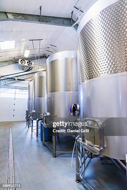 stainless steel tanks in winery cellar - fermentation tank stock pictures, royalty-free photos & images