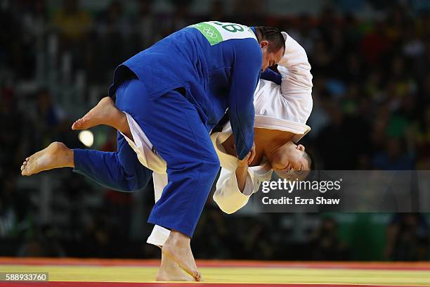 Hisayoshi Harasawa of Japan competes against Abdullo Tangriev of Uzbekistan during the Men's +100kg Judo contest on Day 7 of the Rio 2016 Olympic...