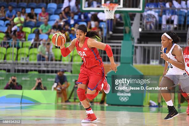 Maya Moore of the USA Basketball Women's National Team drives to the basket against Nirra Fields of Canada on Day 7 of the Rio 2016 Olympic Games at...