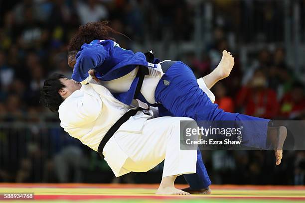 Emilie Andeol of France competes against Song Yu of China during the Women's +78kg Judo contest on Day 7 of the Rio 2016 Olympic Games at Carioca...
