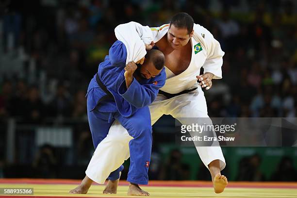 Rafael Silva of Brazil competes against Roy Meyer of Netherlands during the Men's +100kg Judo contest on Day 7 of the Rio 2016 Olympic Games at...
