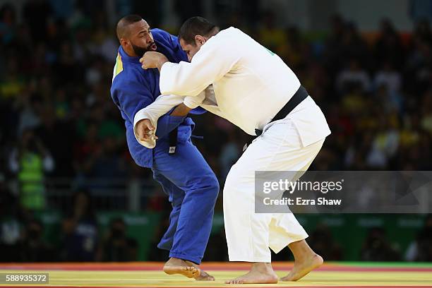 Rafael Silva of Brazil competes against Roy Meyer of Netherlands during the Men's +100kg Judo contest on Day 7 of the Rio 2016 Olympic Games at...