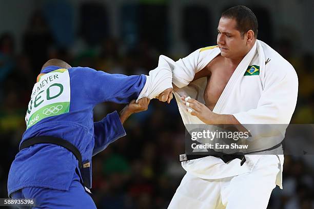 Rafael Silva of Brazil competes against Roy Meyer of Netherlands during the Men's +100kg Judo contest on Day 7 of the Rio 2016 Olympic Games at...