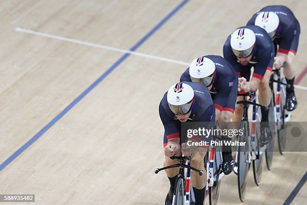 Edward Clancy, Steven Burke, Owain Doull and Bradley Wiggins of Team Great Britain competes in the Men's Team Pursuit First Round on Day 7 of the Rio...