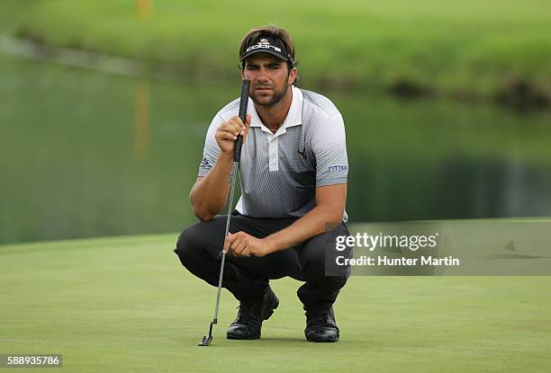 Curtis Thompson lines up his putt on the 18th hole during the second round of the Web.com Tour Price Cutter Charity Championship presented by Dr...