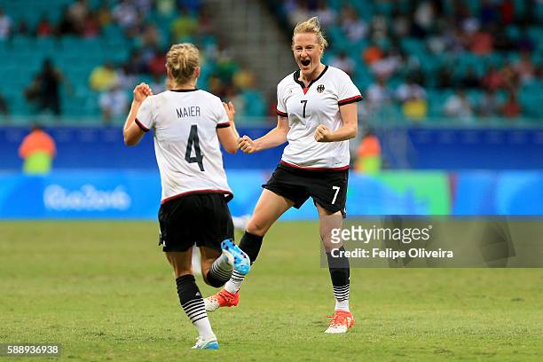 Melanie Behringer of Germany celebrates after scoring the opening goal during the Women's Football Quarterfinal match between China and Germany on...