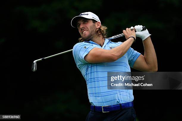 Andrew Loupe plays his shot from the 12th tee during the second round of the John Deere Classic at TPC Deere Run on August 12, 2016 in Silvis,...