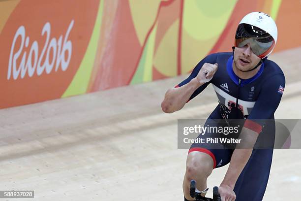 Edward Clancy, Steven Burke, Owain Doull and Bradley Wiggins of Team Great Britain celebrates setting the new world record of 3:50.570 after...