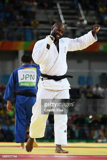 Teddy Riner of France celebrates after defeating Hisayoshi Harasawa of Japan during the Men's +100kg Judo Gold Medal contest on Day 7 of the Rio 2016...