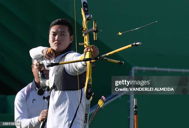 South Korea's archer Ku Bonchan competes in the final of the men's individual competition at the Sambodromo archery venue in Rio de Janeiro, Brazil...