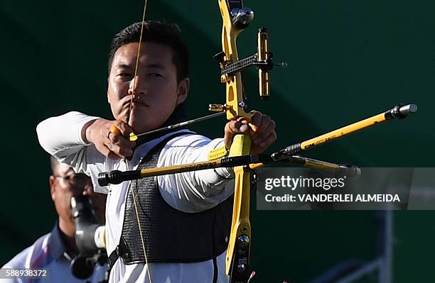 South Korea's archer Ku Bonchan competes in the final of the men's individual competition at the Sambodromo archery venue in Rio de Janeiro, Brazil...