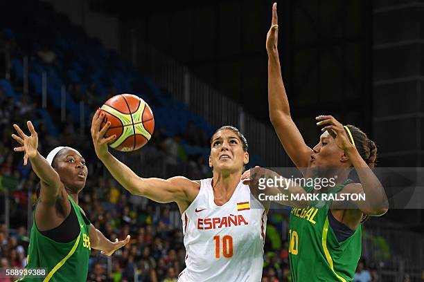 Spain's forward Marta Xargay goes to the basket past Senegal's power forward Astou Traore during a Women's round Group B basketball match between...