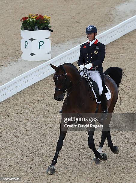 Carl Hester of Great Britain, riding Nip Tuck performs during the final day of the Dressage Grand Prix event on Day 7 of the Rio 2016 Olympic Games...