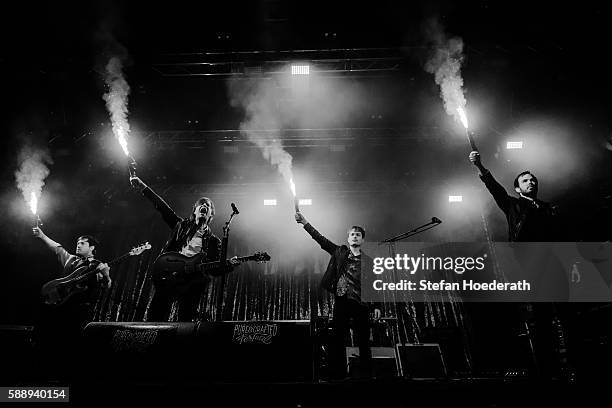 Bassist Carl-Johan Fogelklou, singer Bjoern Dixgard, guitarist Jens Siverstedt and keyboarder Daniel Haglund of Mando Diao perform live on stage...