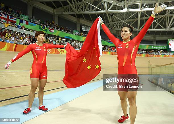 Jinjie Gong and Tianshi Zhong of Team China celebrates winning the gold medal after beating Team Russia in the Women's Team Sprint final for gold on...