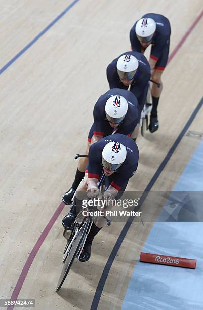 Edward Clancy, Steven Burke, Owain Doull and Bradley Wiggins of Team Great Britain competes in the Men's Team Pursuit Final for Gold on Day 7 of the...