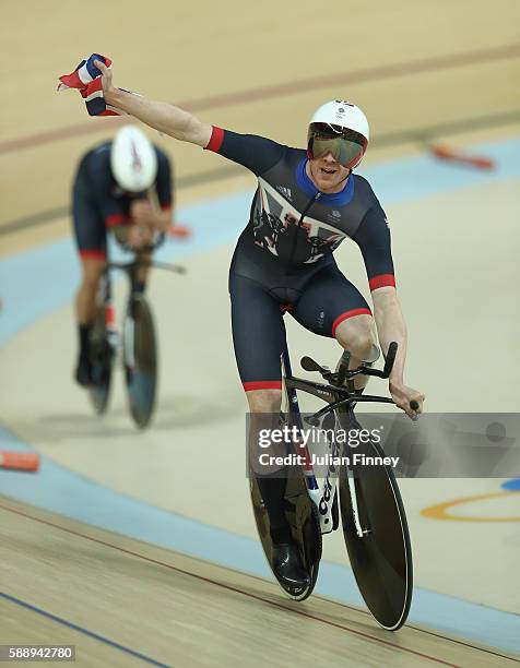 Edward Clancy, Steven Burke, Owain Doull and Bradley Wiggins of Team Great Britain celebrates winning the gold medal after the Men's Team Pursuit...