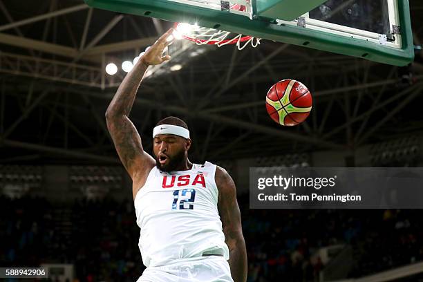 Demarcus Cousins of the United States dunks the ball against Serbia in the Men's Preliminary Round Group A game on Day 7 of the Rio 2016 Olympic...