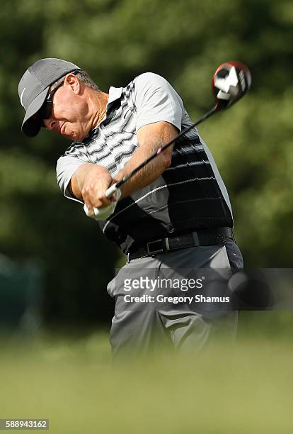 Bob Tway hits his drive on the fifth hole during the second round of the 2016 US Senior Open at Scioto Country Club on August 12, 2016 in Columbus,...