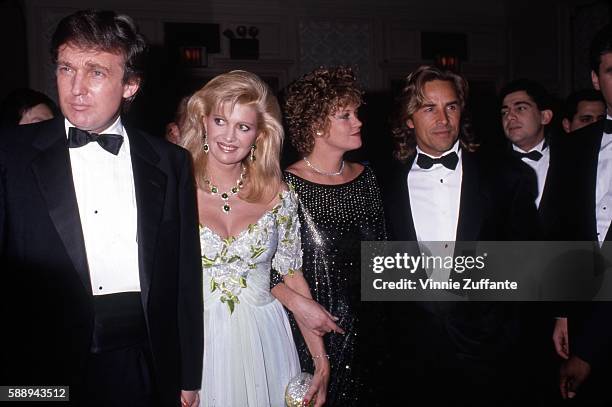 Property developer Donald Trump and wife Ivana Trump with actors Don Johnson and Melanie Griffith attend a Police Athletic League event for...