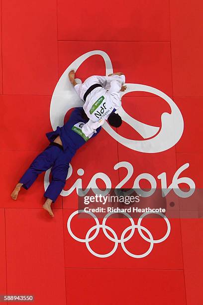 Hisayoshi Harasawa of Japan competes against Abdullo Tangriev of Uzbekistan during the Men's +100kg Judo contest on Day 7 of the Rio 2016 Olympic...