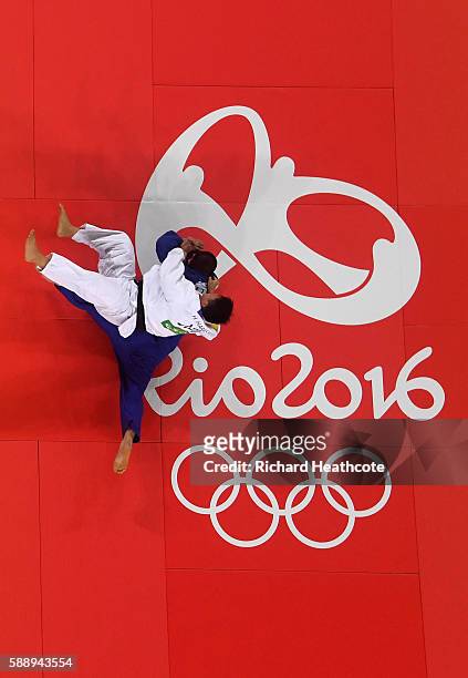 Hisayoshi Harasawa of Japan competes against Abdullo Tangriev of Uzbekistan during the Men's +100kg Judo contest on Day 7 of the Rio 2016 Olympic...