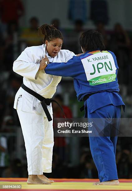 Kanae Yamabe of Japan and Kayra Sayit of Turkey compete during the Women's +78kg Judo contest on Day 7 of the Rio 2016 Olympic Games at Carioca Arena...